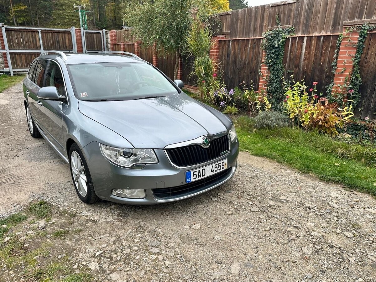 skoda-superb-1-6-2011-kozeny-interier - 6